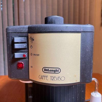 DELONGHI ESPRESSO MACHINE | A Caffe Traviso model espresso machine with both steamer and espresso functions