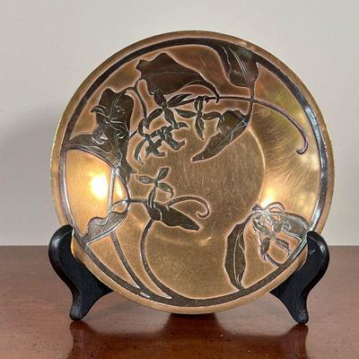 MIXED METAL SAUCER | Likely Japanese, silver overlay on brass, showing flowering branches - dia. 5-3/4 in.