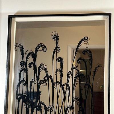 DECORATIVE WALL MIRROR | Mirror with swirling reed overlay decoration within a black painted frame with a white interior trim - 37-3/4 x...