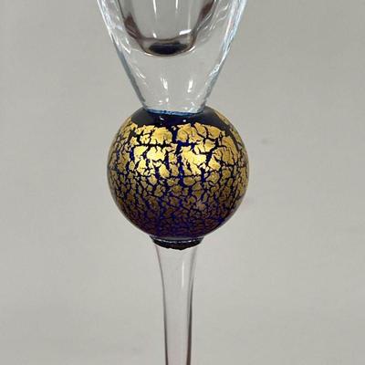 (2pc) ART GLASS | Including a tall champagne flute with ribbed cup and a cobalt and gilt stem, signed on the bottom and dated 1990; and a...
