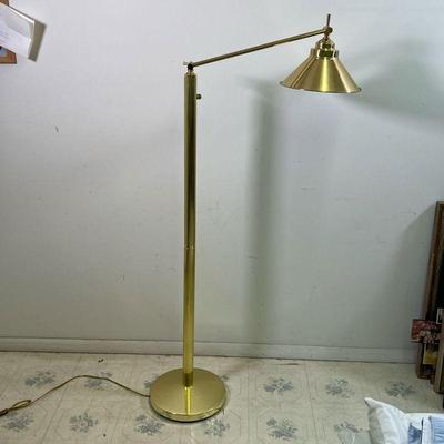 BRASS FLOOR LAMP | Floor / reading lamp, with an articulating arm on a reeded column base (dia. 11 in.) - h. 50 in. (adjustable)
