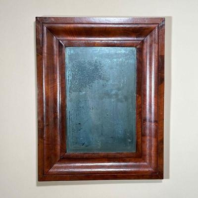 ANTIQUE WALL MIRROR | A veneered frame with antique glass - h. 27 x w 21 in.