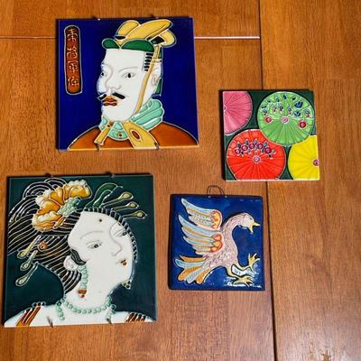 (4pc) DECORATIVE TILE PLAQUES | Including two of Chinese subject (6 x 6 in.), one with parasols, and one with a phoenix in relief