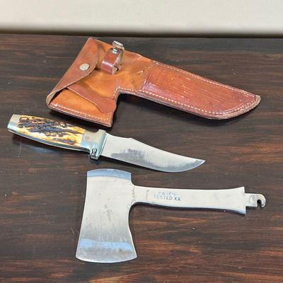KNIFE & HAND AXE | In a leather carrying case, knife with a horn style handle and a separate axe head, possibly able to attach to the...