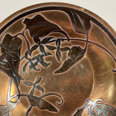 MIXED METAL SAUCER | Likely Japanese, silver overlay on brass, showing flowering branches - dia. 5-3/4 in.