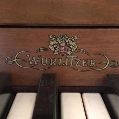 Wurlitzer upright piano and bench $399
56 X 24 X 37