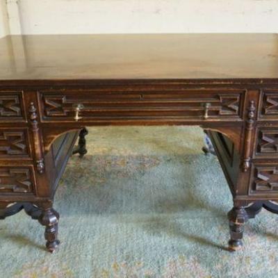 1238	ENGLISH 7 DRAWER LIBRARY DESK, DESK UNDER CARRIAGE NEEDS TO BE REBUILT, APPROXIMATELY 60 IN X 39 IN X 30 IN HIGH
