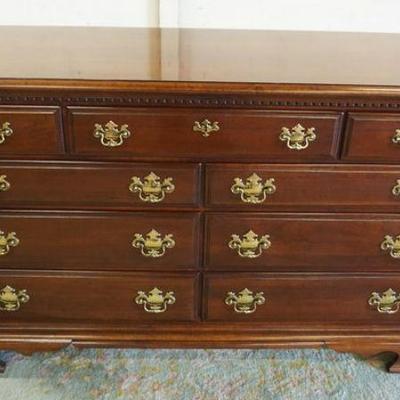 1233	LEXINGTON CHERRY 9 DRAWER LOW CHEST, SOME FINISH WEAR TO TOP, APPROXIMATELY 19 IN X 56 IN X 35 IN
