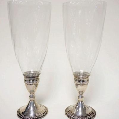 1043	PAIR OF STERLING WEIGHTED HURRICANE LAMPS, APPROXIMATELY 31 IN HIGH
