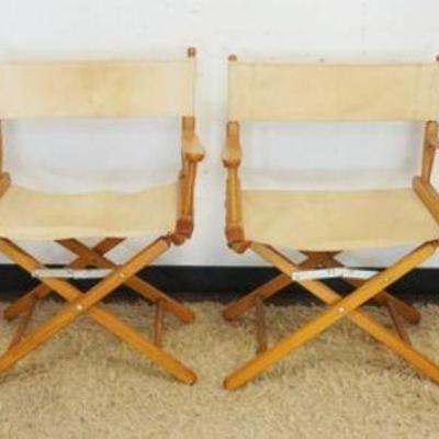 1031	LOT OF 4 FOLDING DIRECTORS CHAIRS
