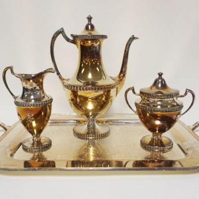 1053	4 PIECE SILVERPLATE TEASET
