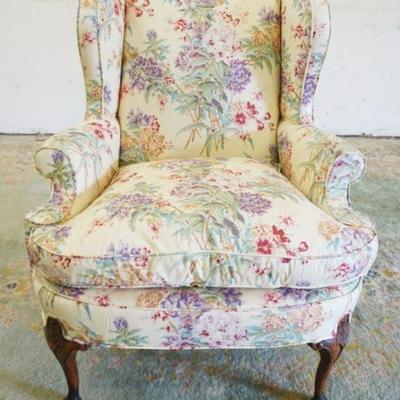 1242	UPHOLSTERED ARMCHAIR W/FLORAL UPHOLSTERY
