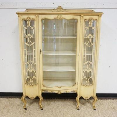 1034	FRENCH PROVINCIAL CRYSTAL CABINET IN IVORY FINISH W/ROW FRONT GLASS DOOR, APPROXIMATELY 52 IN X 18 IN X 72 IN HIGH
