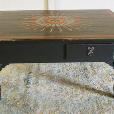1228	PAINT DECORATED SOUTHWESTERN COFFEE TABLE, 2 DRAWER, SOME DISCOLORATION ON TOP, APPROXIMATLEY 46 IN X 44 IN X 22 IN HIGH
