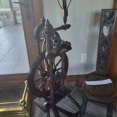 18th Century Northern European style oak spinning wheel with oak chair. Restored at smithsonian. Includes box of spinning supplies