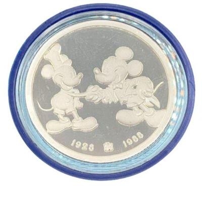 Lot 13
1988 Mickey 60 Years With You 'Exclusive Theme Park' Collectors Coin