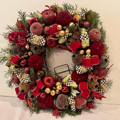 Mackenzie Childs Holiday Wreath complete with a string of battery operated lights. Measures 18