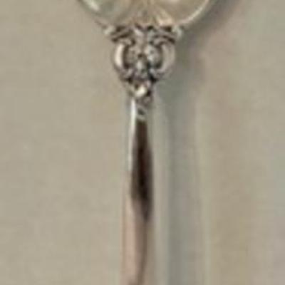 Large Sterling Grand Baroque Serving Spoon measuring 9". In good condition with light wear. 