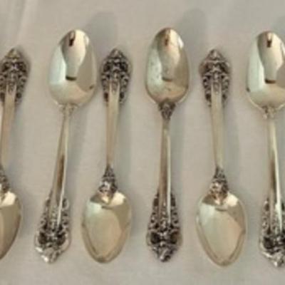8 Wallace Grand Baroque Sterling Teaspoons in good condition with light wear. 