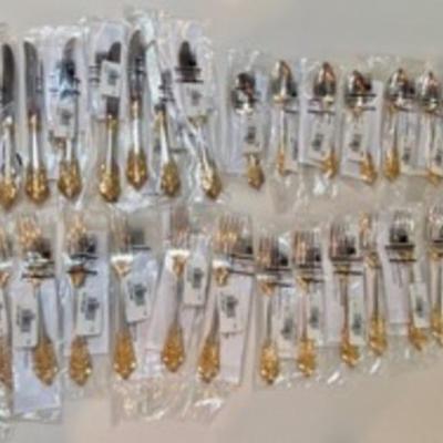 New Wallace Grand Baroque Sterling Flatware. Lovely new two-tone set with each piece in the package. 