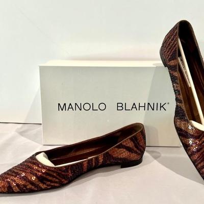 Pair of Vintage Manolo Blahnik Ladies Shoes in good/used condition. 

Size 38.5 and comes with the box. 