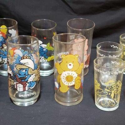 Collectible Glasses Featuring Smurfs, Care Bears, & Flintstones...