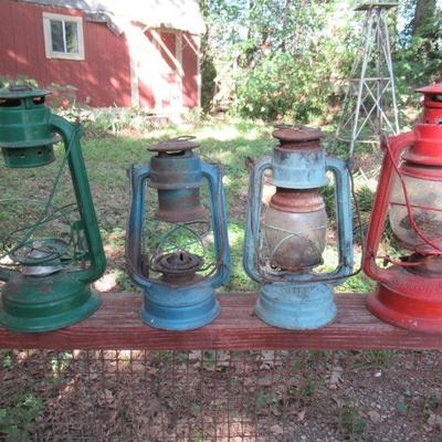4 VINTAGE KEROSENE LATERNS INCLUDES 2 SWALLOW BRAND LANTERNS MODELS 215 & 225, JUPITER 1 LANTERN AND WORLD-LIGHT GLOBE BRAND 303....