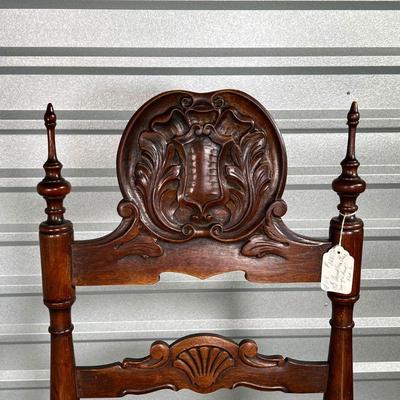 CARVED SHIELD ARMCHAIR  | 19th century, carved wood armchair crested by an intricately carved shield, with rush seat - h. 43-1/2 x 26 x...