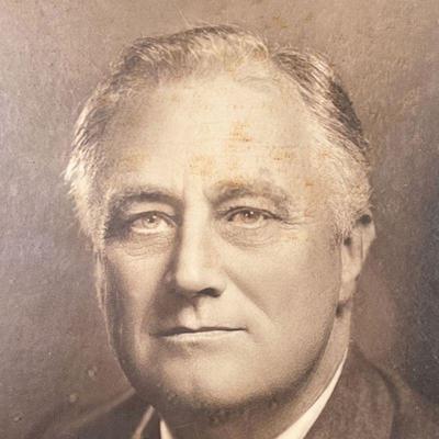FRAMED FDR PORTRAIT  |
Photographic portrait of Franklin D. Roosevelt, possible a silver gelatin print, signed lower right, in a dark...