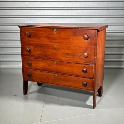 AMERICAN CHERRY BLANKET CHEST  |
Having a lift top with two false drawer fronts over two full with drawers with matching brass...