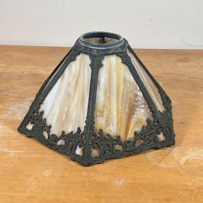 SLAG GLASS LAMPSHADE  |
Having six slag glass panels in a decorative metal frame with scrollwork - h. 8 x dia. 15 in.