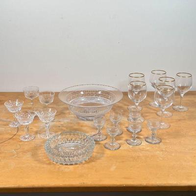 GROUP MISC. GLASSWARE  |
Including six water goblets with gold rims, six small cruet glasses, three small cocktail glasses, and two other...