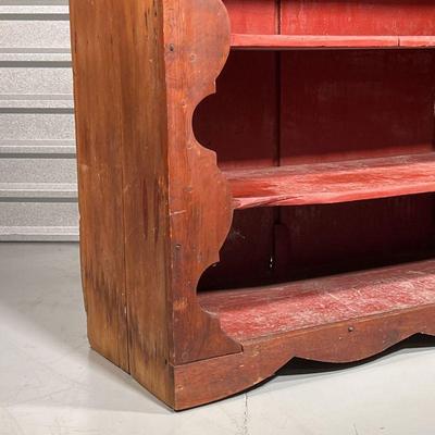 COUNTRY PAINTED OPEN SHELF  |
Having red painted open shelves on the front with a scalloped decorated opening various coats of paint and...