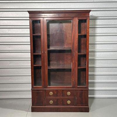 ANTIQUE DISPLAY CABINET  |
Having three front glazed doors over two drawers flanked by small cabinet doors - h. 64 x w. 38 x d. 13 in.