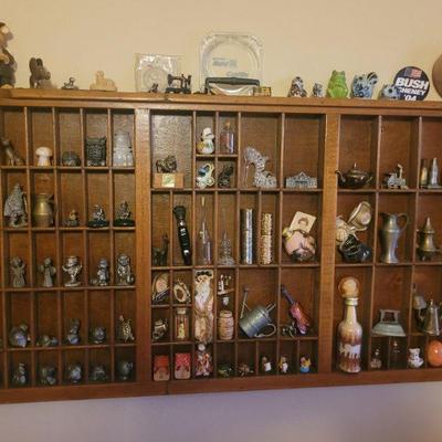 larger shadow box full of miniatures, sold separately