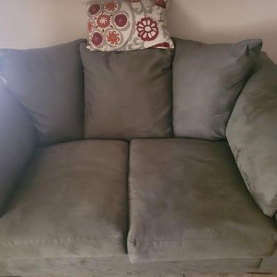 fabric loveseat, no stains, rips or tears, there is a matching sofa in the next picture. Both of these pieces were used only a very few...