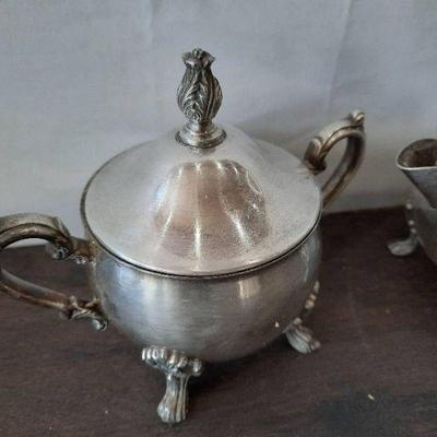 https://www.auctionsynergy.com/auction/6203/item/vintage-sheridan-taunton-silversmiths-sugar-bowl-and-creamer-m8-436961/