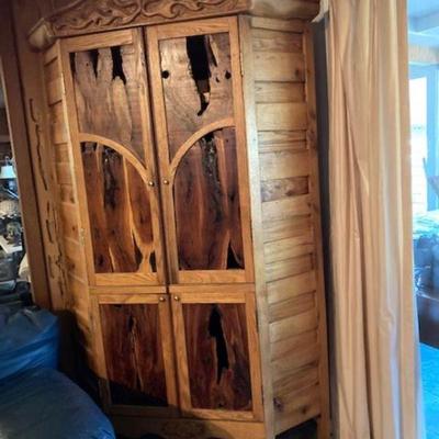 This cabinet was built for Robert and Phyllis Danley of Prescot Valley, Arizona. It was completed April 10th 1994. The redwood used in...