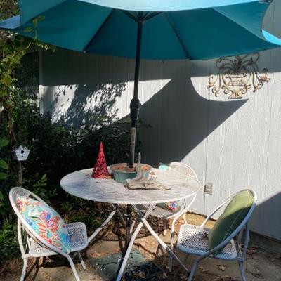 Patio table, chairs and umbrella 