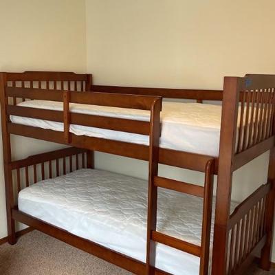 Nice Wooden Bunk Beds with Fully encased in plastic Twin Mattresses