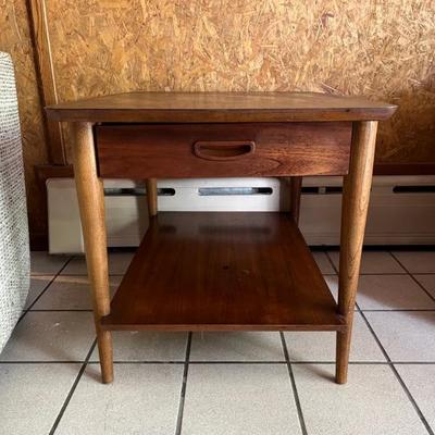 a pair of MCM end tables with a single draw and formica tops