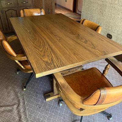 1970s kitchen table with 4 swivel chairs