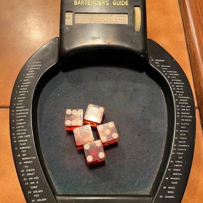 horse shoe shaped bartender's guide and dice game