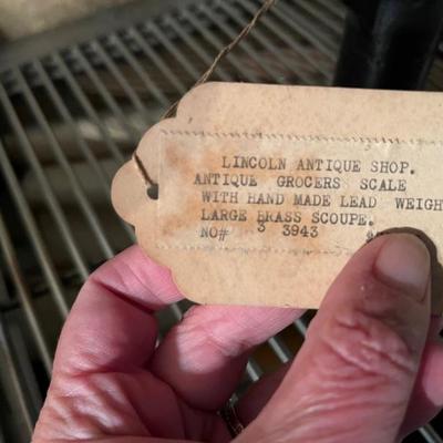 antique grocery scale with large brass scoop