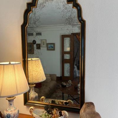 vintage black and gold framed mirror