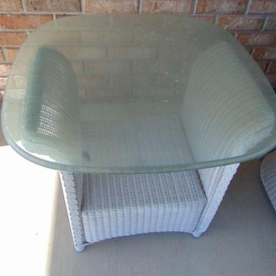 Wicker table with glass top