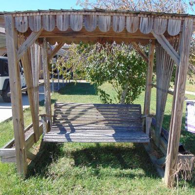 Wood swing with wood cover