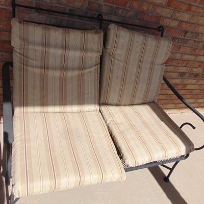wrought iron settee matches table and rockers