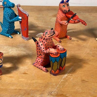 (4pc) CALIXTO CARVED & PAINTED FIGURES  |
Carved and painted wood animal figures, signed on the bottom, 