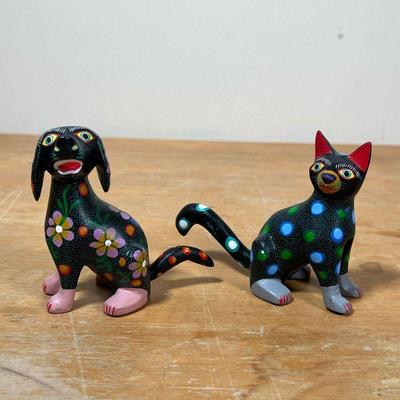 (2pc) ANGEL OLIVERA MELCHOR (MEXICAN, 20TH C)  | Mexican (Oaxaca) folk art, two carved and painted animal figures, including a cat and a...